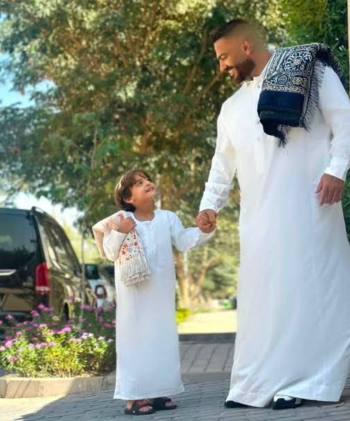 آدم ووالده الفنان تامر حسني