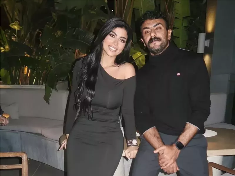 كارولين عزمي وأحمد العوضي